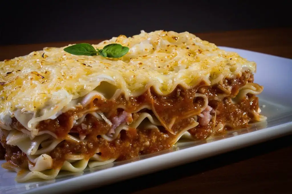 Lasagna in a ceramic bowl cooked in smoker